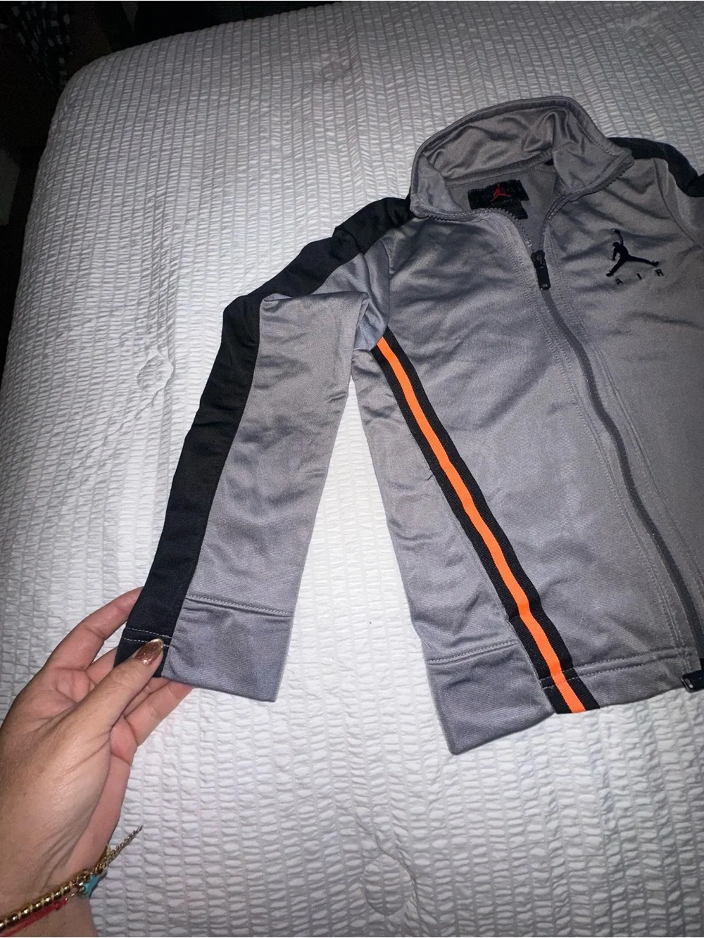 Jordan Gray Track Jacket with Orange Stripes and Black Panels
